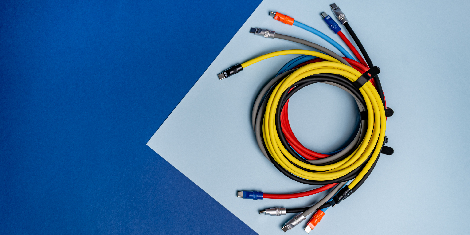 Kabel Newell USB-C - USB-C 100 W, 2 m, silikonowy, niebiesko-pomarańczowy